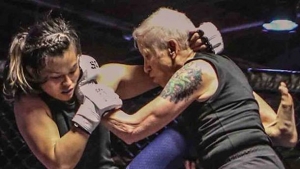 badass-68-year-old-mma-grandma-takes-beatdown-from-24-year-old-opponent.jpg